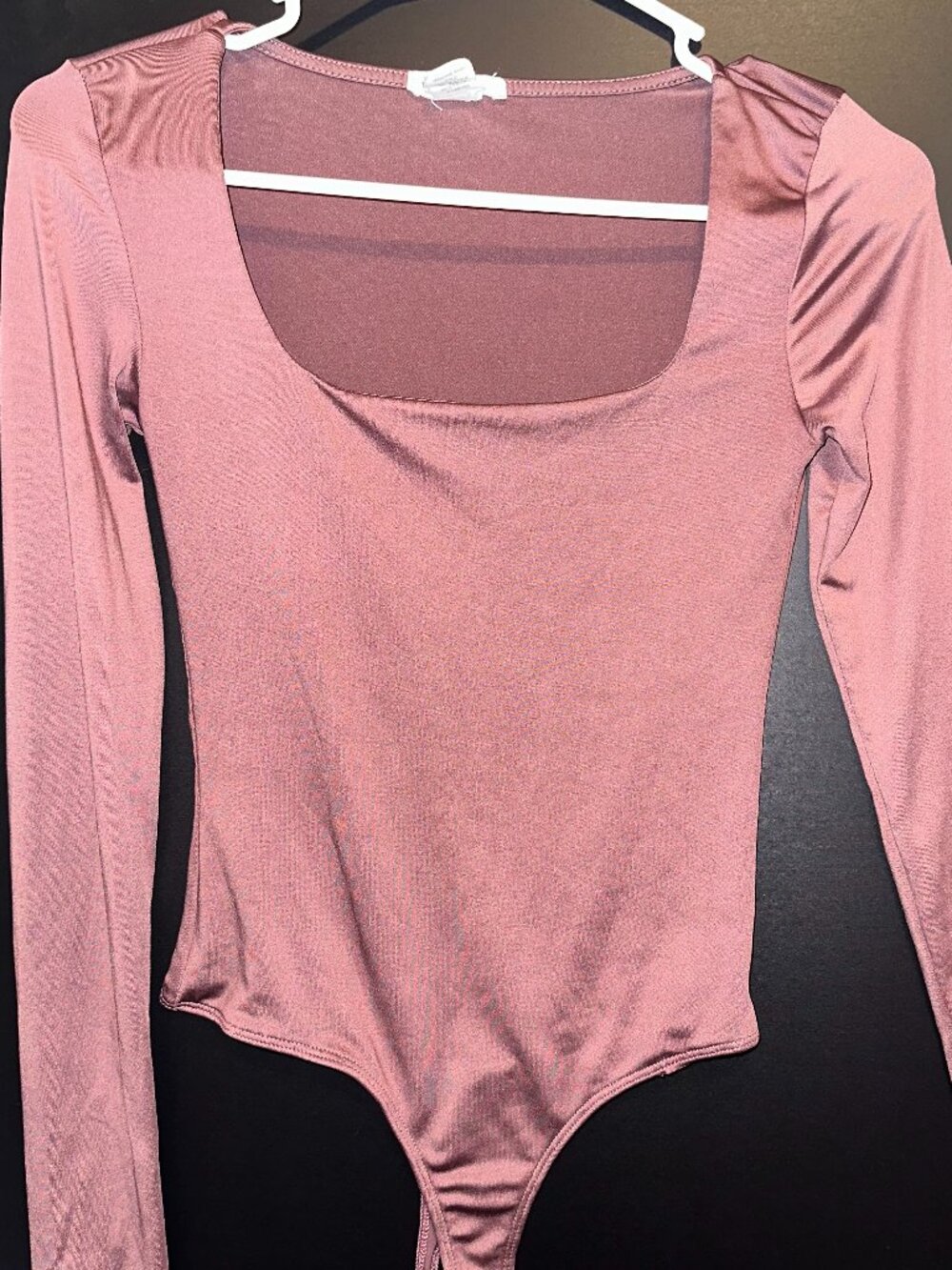 Size Small Bodysuit Pink/Purple color. Soft material